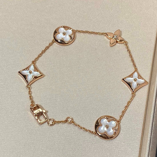 [Rose Jewelrys]STAR AND SUN 5 MOTIF MOP PINK GOLD BRACELET