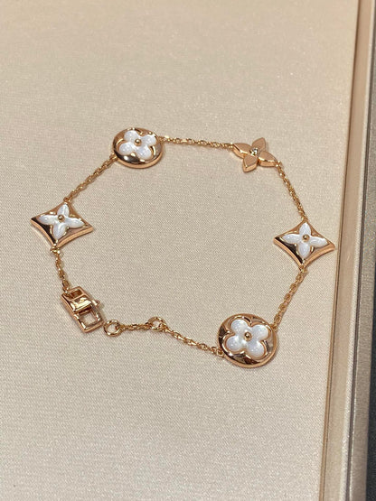 []STAR AND SUN 5 MOTIF MOP PINK GOLD BRACELET