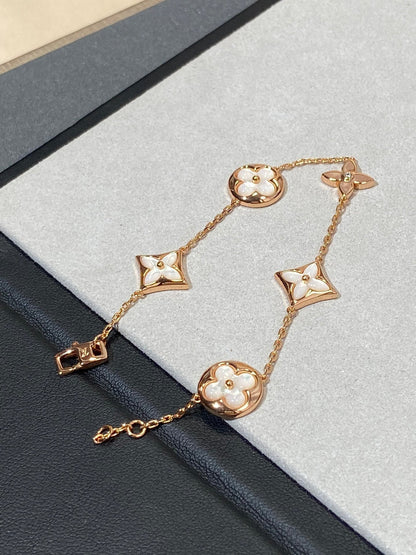 []STAR AND SUN 5 MOTIF MOP PINK GOLD BRACELET