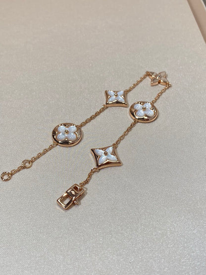 []STAR AND SUN 5 MOTIF MOP PINK GOLD BRACELET