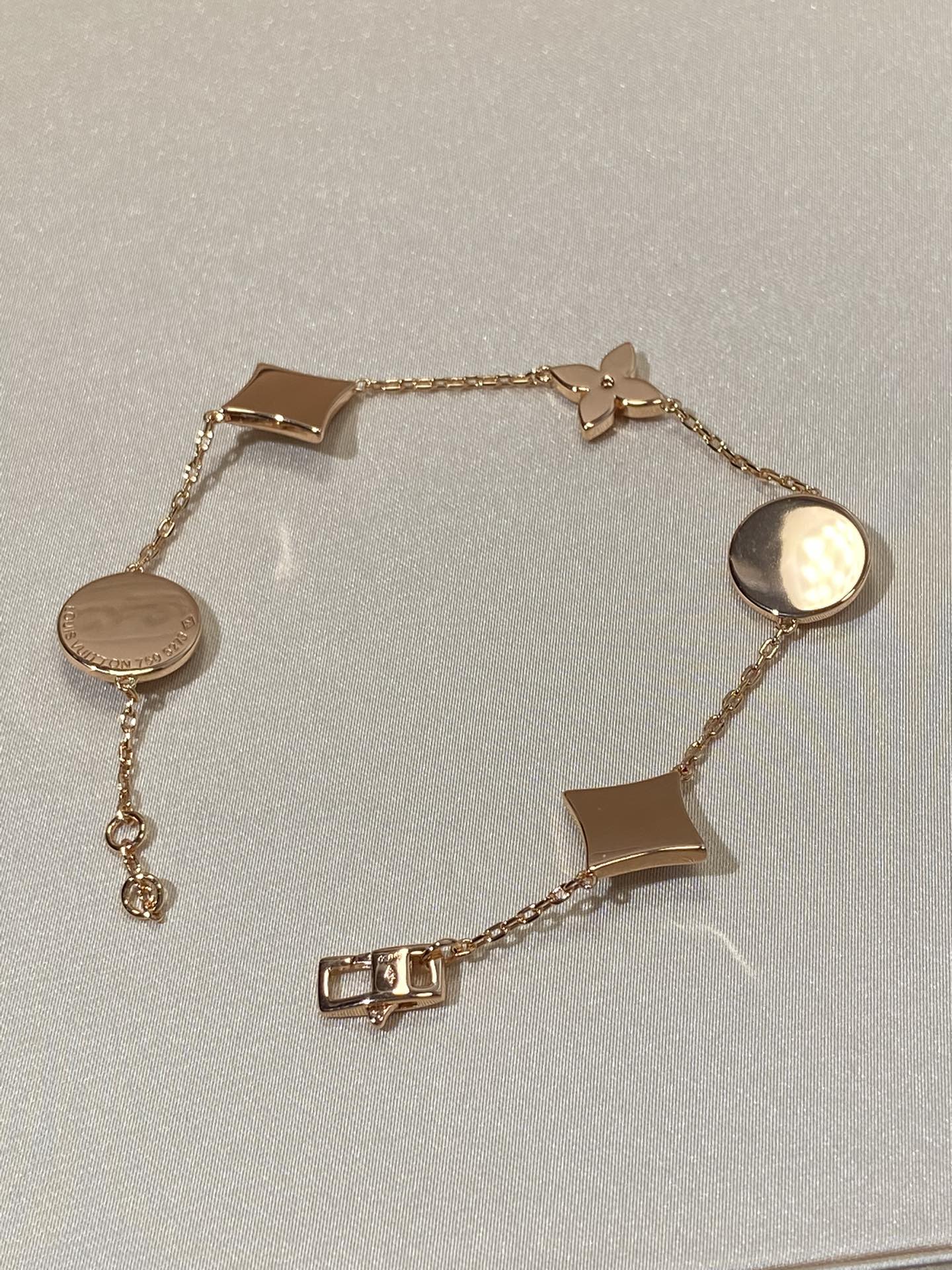 []STAR AND SUN 5 MOTIF MOP PINK GOLD BRACELET