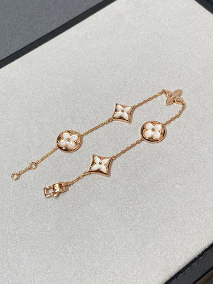 []STAR AND SUN 5 MOTIF MOP PINK GOLD BRACELET