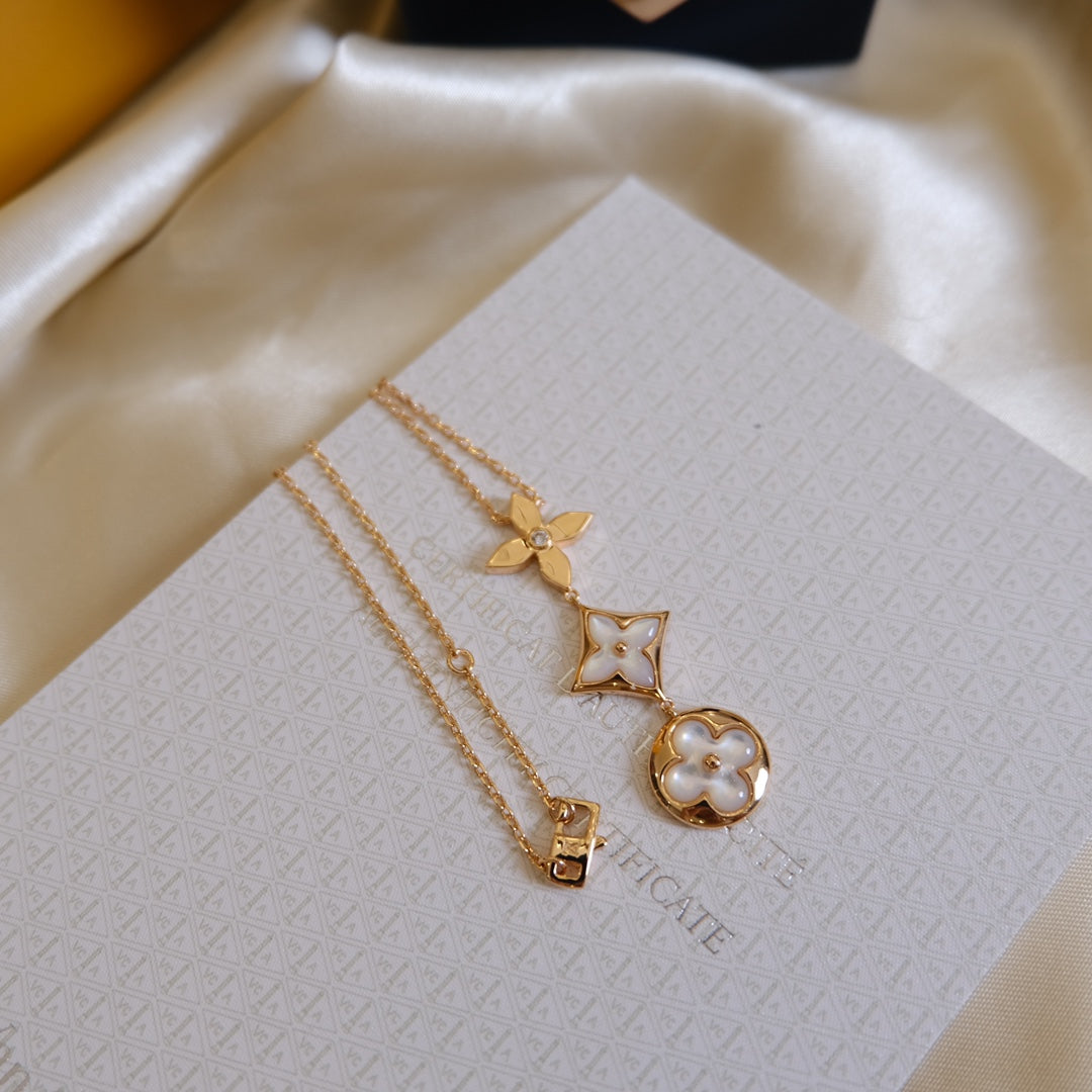 []COLOR BLOSSOM LARIAT NECKLACE PINK GOLD WHITE MOTHER PEARL AND DIAMOND